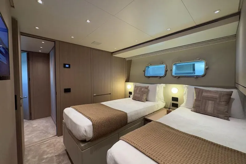  Yacht Photos Pics Luxurious 2024 Sanlorenzo SL90A yacht cabin with twin beds and modern decor.