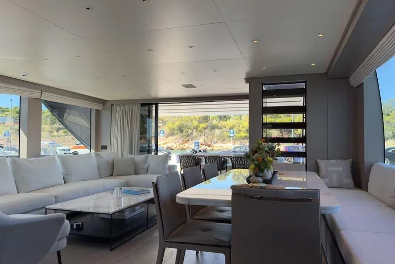  Yacht Photos Pics Luxurious interior of 2024 Sanlorenzo SL90A yacht with elegant seating and dining area.