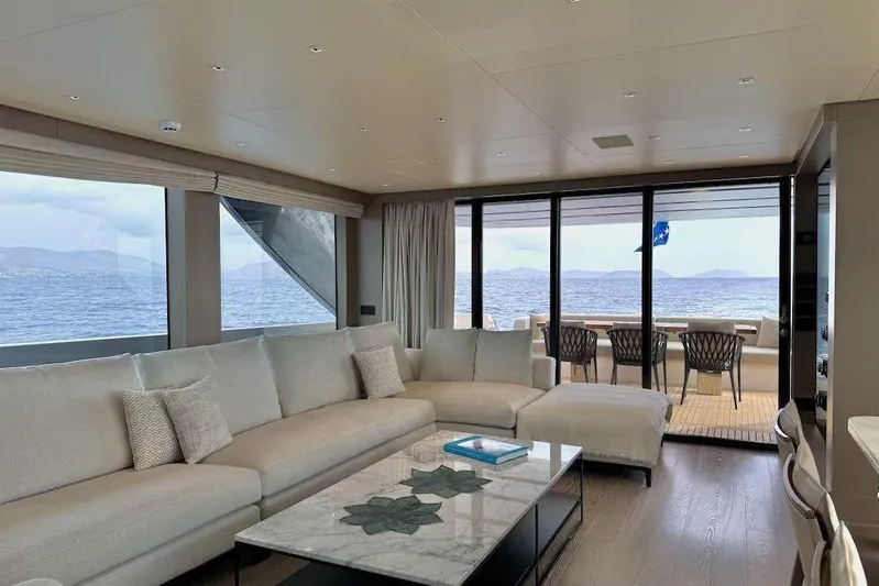 Yacht Photos Pics Luxurious interior of 2024 Sanlorenzo SL90A yacht with ocean view and elegant furnishings.