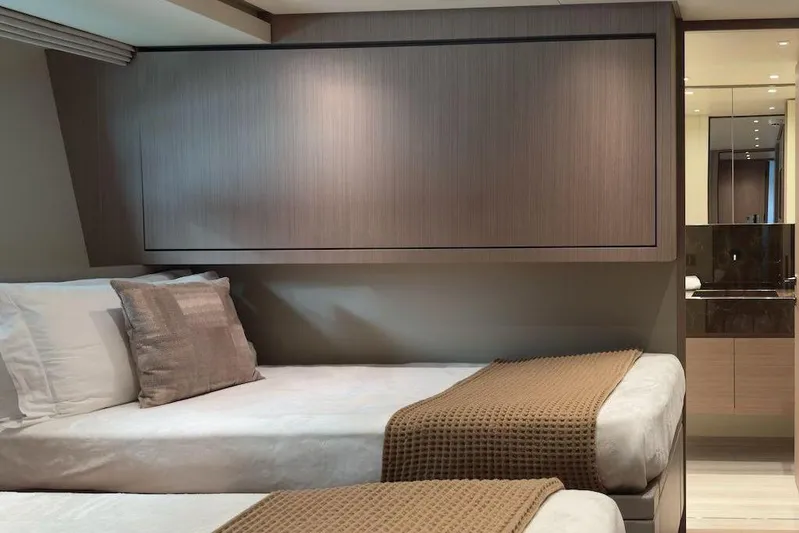  Yacht Photos Pics Luxurious 2024 Sanlorenzo SL90A yacht cabin with twin beds and modern decor.