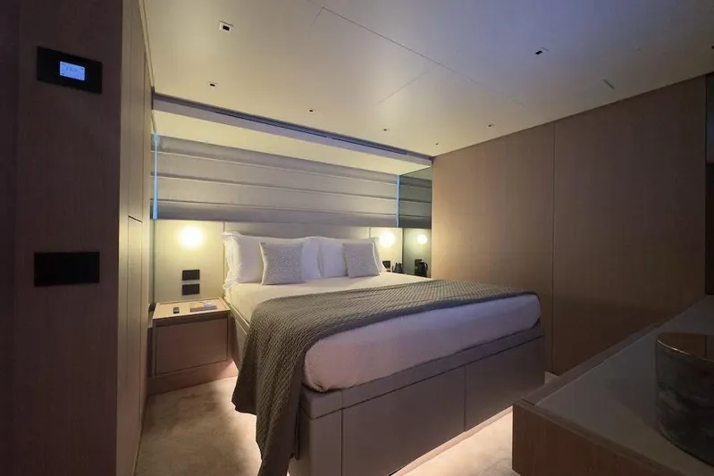  Yacht Photos Pics Luxurious bedroom interior of 2024 Sanlorenzo SL90A yacht with modern design.