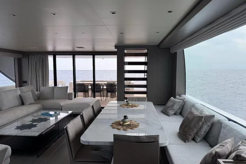  Yacht Photos Pics Luxurious interior of 2024 Sanlorenzo SL90A yacht with ocean view and elegant seating.
