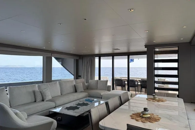 Yacht Photos Pics Luxurious interior of 2024 Sanlorenzo SL90A yacht with ocean view through large windows.
