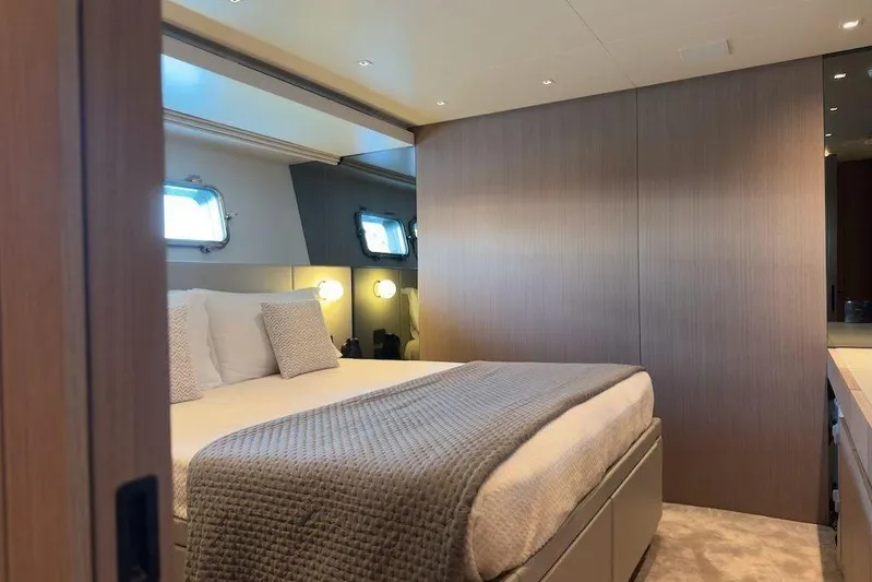  Yacht Photos Pics Luxurious bedroom interior of 2024 Sanlorenzo SL90A yacht with modern design.