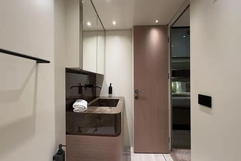  Yacht Photos Pics Luxurious bathroom interior of 2024 Sanlorenzo SL90A yacht with modern fixtures.