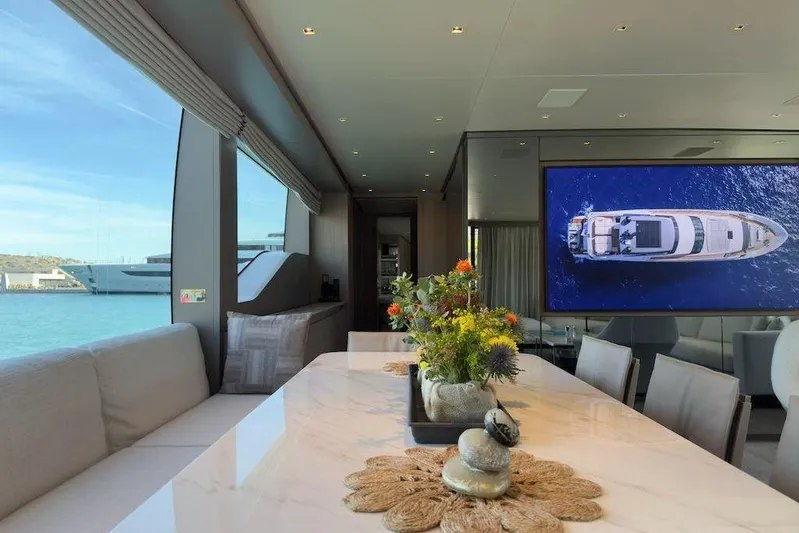  Yacht Photos Pics Luxurious interior of 2024 Sanlorenzo SL90A yacht with elegant dining area and sea view.