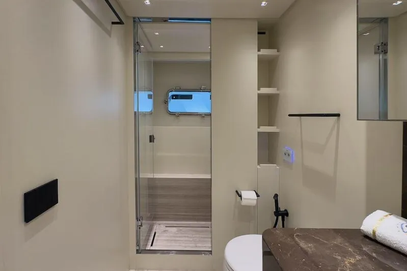  Yacht Photos Pics Luxurious bathroom interior of 2024 Sanlorenzo SL90A yacht, featuring modern design and elegant fixtures.