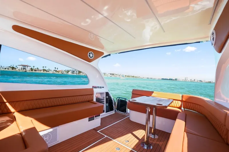 Custom Order Your 355 Today! Yacht Photos Pics Luxurious interior of 2025 Hanover 355 Outboard boat with ocean view.