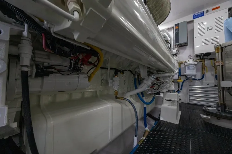 Boujie Yacht Photos Pics Engine room of 2025 Viking 82 Convertible yacht, showcasing advanced machinery and systems.