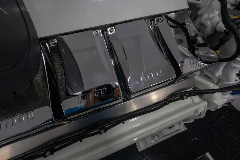 Boujie Yacht Photos Pics Engine compartment of 2025 Viking 82 Convertible yacht with MTU components.