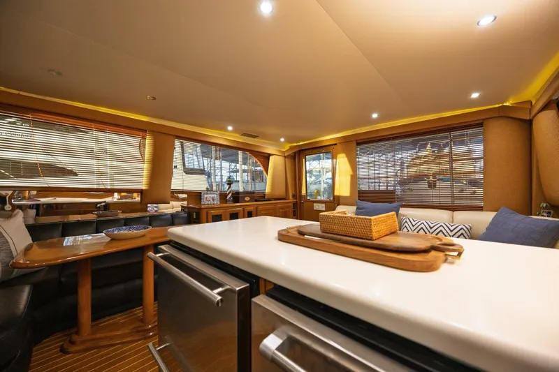 Miss Scarlett Yacht Photos Pics Luxurious interior of a 1998 Viking 50 Convertible yacht with modern furnishings.