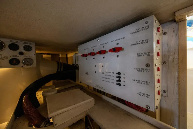 Miss Scarlett Yacht Photos Pics Electrical panel inside 1998 Viking 50 Convertible boat, showing various circuit controls.