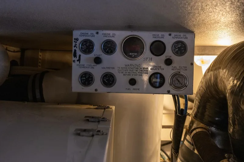 Miss Scarlett Yacht Photos Pics Control panel of a 1998 Viking 50 Convertible boat engine room.