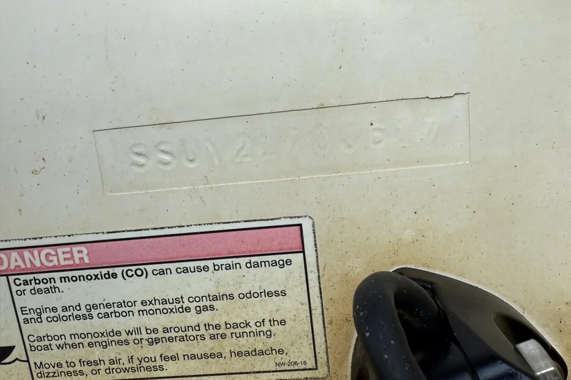  Yacht Photos Pics Hull identification number and carbon monoxide warning on 2017 Pursuit OS 325 Offshore boat.