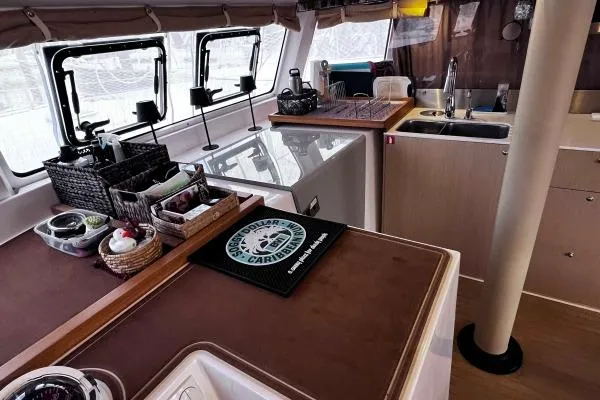 Meraki Yacht Photos Pics Interior of 2022 NEEL 43 yacht kitchen with modern amenities and stylish design.