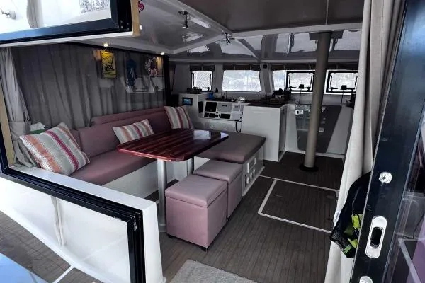 Meraki Yacht Photos Pics Interior of 2022 NEEL 43 yacht with modern seating and navigation area.