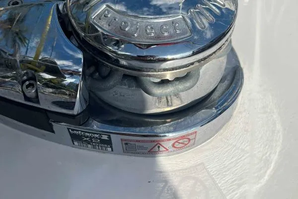 Meraki Yacht Photos Pics Chrome winch on NEEL 43, 2022 model, reflecting sky and surroundings.