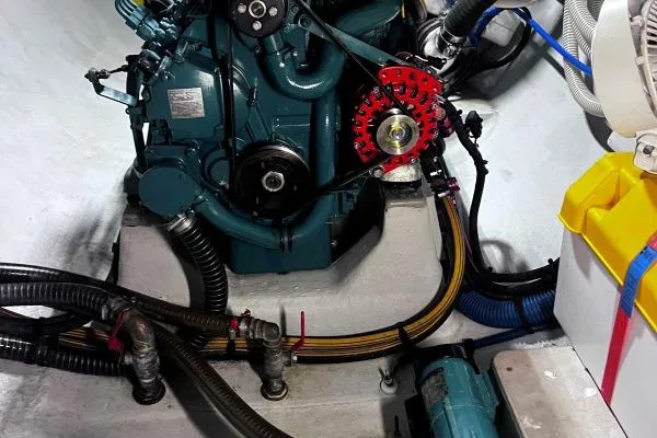 Meraki Yacht Photos Pics Engine compartment of a 2022 NEEL 43, showcasing mechanical components and wiring.