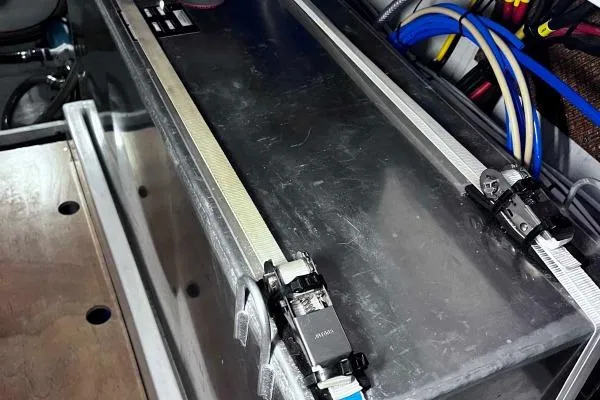 Meraki Yacht Photos Pics Securely strapped metal box with cables, inside a NEEL 43 model, 2022.