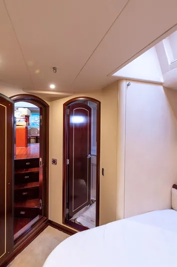 Cygnus Of Anglesey Yacht Photos Pics Luxurious interior of 2004 Oyster 82 yacht with elegant wood finishes.