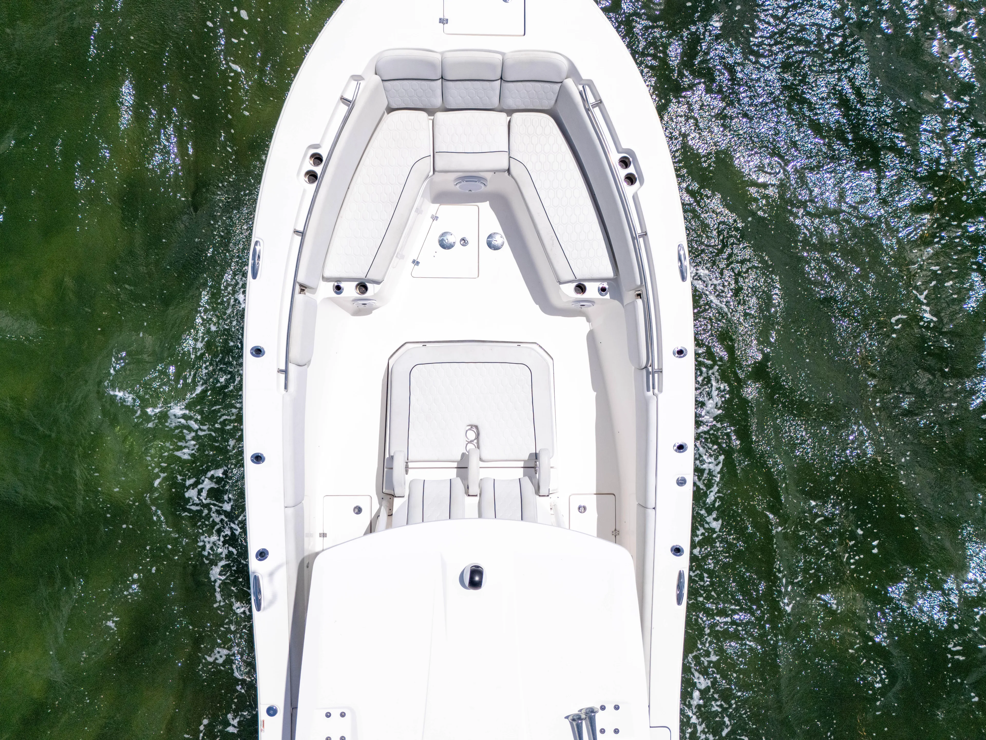 Yacht Photos Pics Overhead view of 2021 Sea Fox 328 Commander boat on green water.