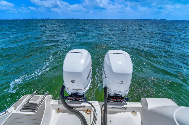  Yacht Photos Pics 2021 Sea Fox 328 Commander boat with dual engines on open water.