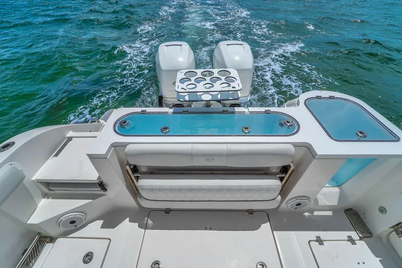  Yacht Photos Pics 2021 Sea Fox 328 Commander boat with dual engines and fishing setup on open water.