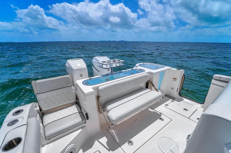  Yacht Photos Pics 2021 Sea Fox 328 Commander boat interior with ocean view, featuring seating and fishing amenities.