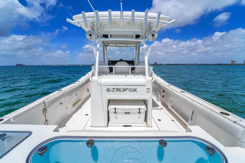  Yacht Photos Pics 2021 Sea Fox 328 Commander boat on open water under blue sky.