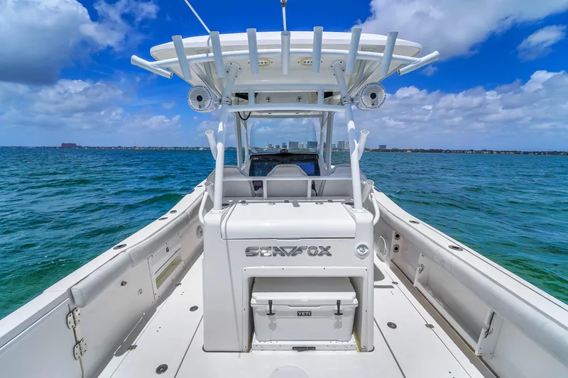  Yacht Photos Pics 2021 Sea Fox 328 Commander boat on open water under blue sky.