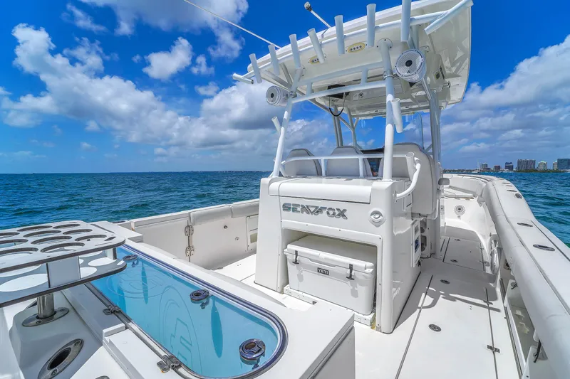 Yacht Photos Pics 2021 Sea Fox 328 Commander boat on open water under blue sky.