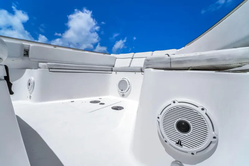  Yacht Photos Pics 2021 Sea Fox 328 Commander boat interior with speakers, under a clear blue sky.