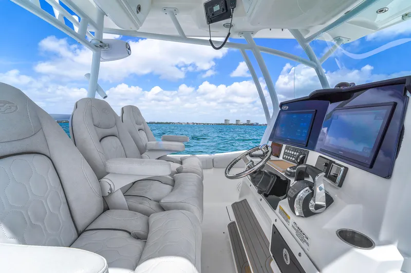  Yacht Photos Pics 2021 Sea Fox 328 Commander boat interior with plush seating and advanced navigation system.