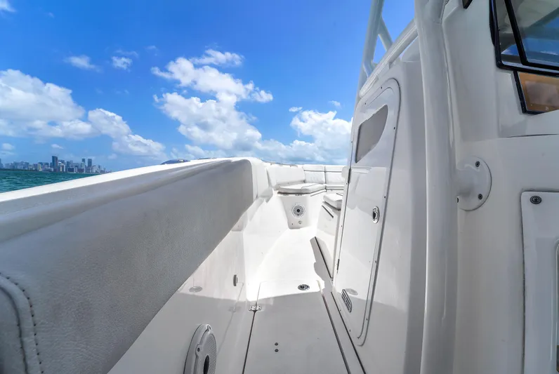  Yacht Photos Pics 2021 Sea Fox 328 Commander boat deck with clear blue sky and ocean view.