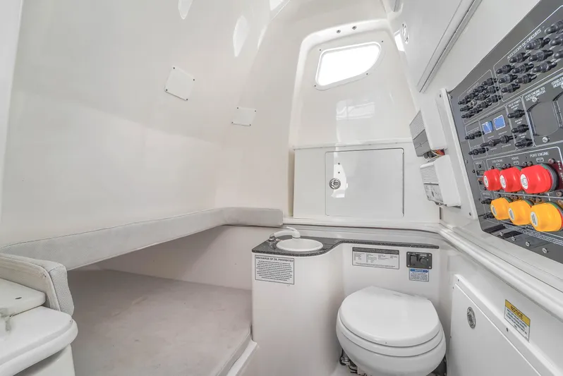  Yacht Photos Pics Interior of 2021 Sea Fox 328 Commander boat with toilet and control panel.