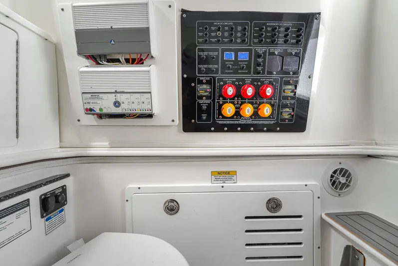  Yacht Photos Pics Control panel of a 2021 Sea Fox 328 Commander boat, featuring switches and electrical components.