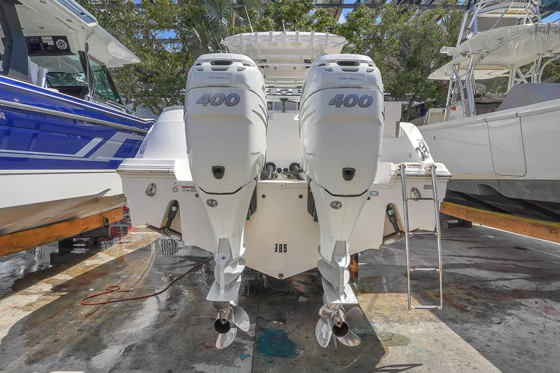  Yacht Photos Pics 2021 Sea Fox 328 Commander with twin 400 horsepower engines, docked in a marina.