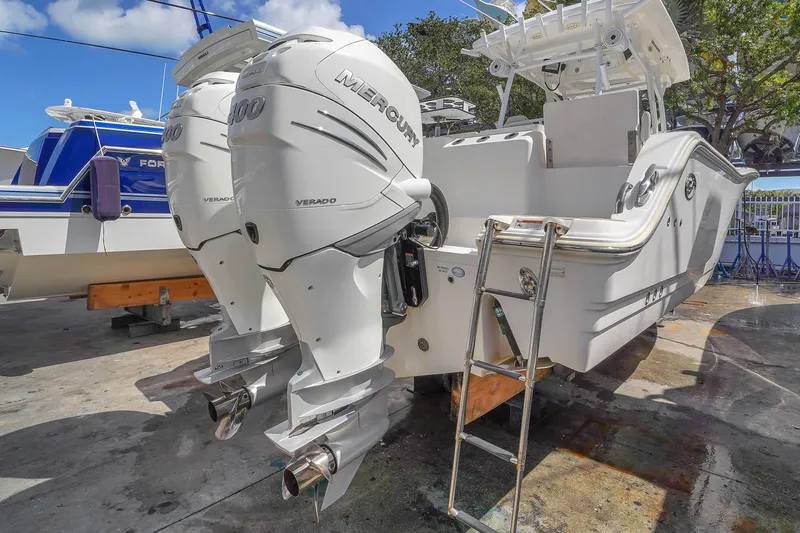  Yacht Photos Pics 2021 Sea Fox 328 Commander with twin Mercury outboard engines, docked outdoors.