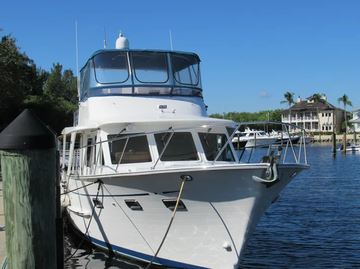 C'est La Vie Yacht Photos Pics 2010 DeFever 48 Offshore yacht docked at a marina.