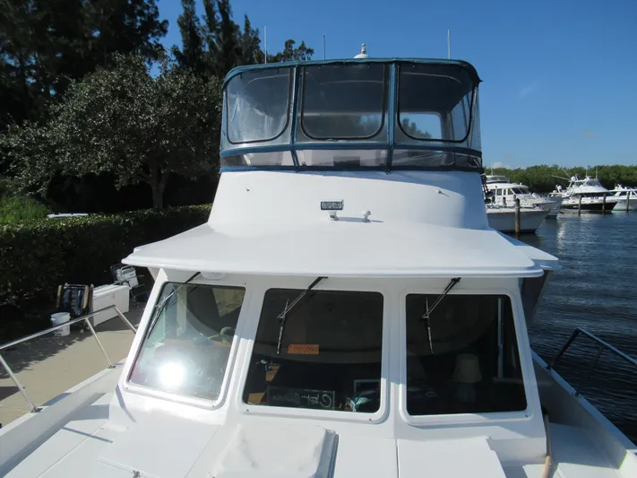 C'est La Vie Yacht Photos Pics DeFever 48 Offshore 2010 yacht docked at a marina.