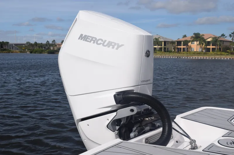  Yacht Photos Pics 2025 Monterey 275SS Super Sport with Mercury Verado engine on a scenic waterway.