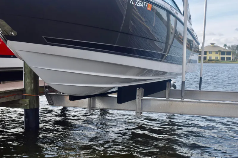  Yacht Photos Pics 2025 Monterey 275SS Super Sport boat on lift by waterfront.