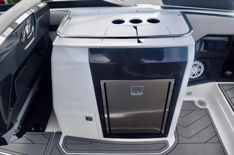  Yacht Photos Pics 2025 Monterey 275SS Super Sport boat interior with sleek kitchenette and modern design.