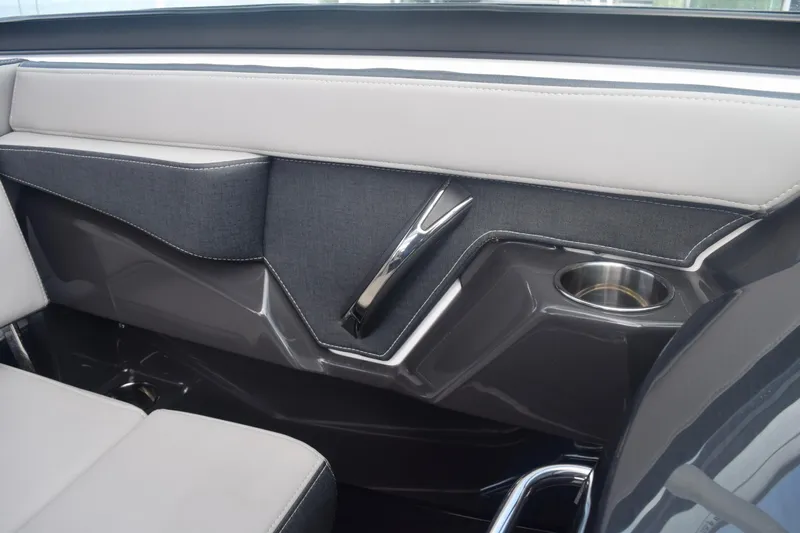  Yacht Photos Pics Interior of 2025 Monterey 275SS Super Sport boat with sleek design and cup holder.