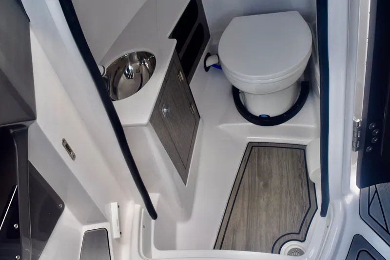  Yacht Photos Pics 2025 Monterey 275SS Super Sport boat bathroom with toilet and sink.