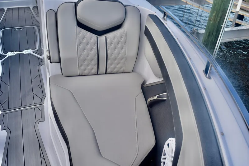  Yacht Photos Pics 2025 Monterey 275SS Super Sport boat interior with luxurious seating and modern design.