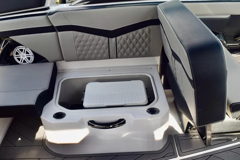  Yacht Photos Pics 2025 Monterey 275SS Super Sport boat interior with storage compartment and seating.