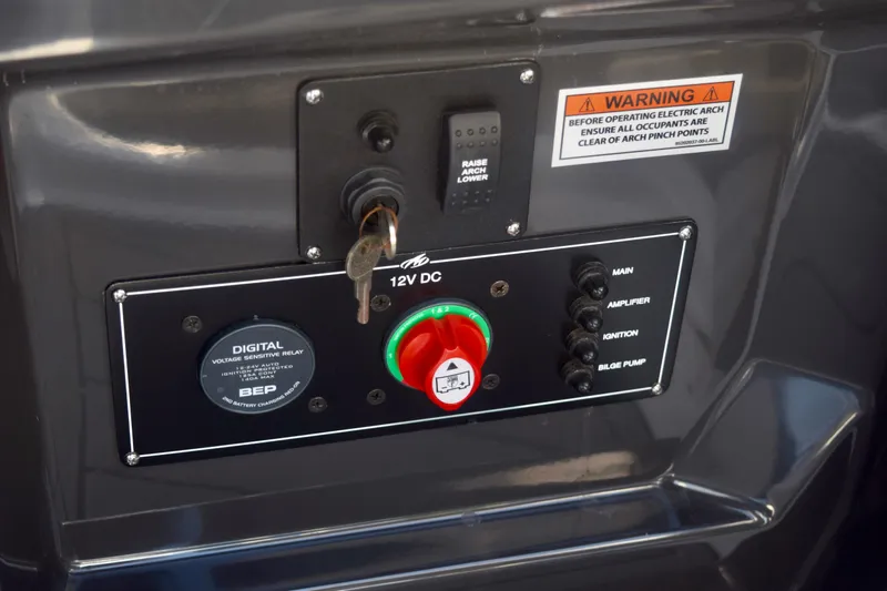  Yacht Photos Pics Control panel of 2025 Monterey 275SS Super Sport boat with key and warning label.