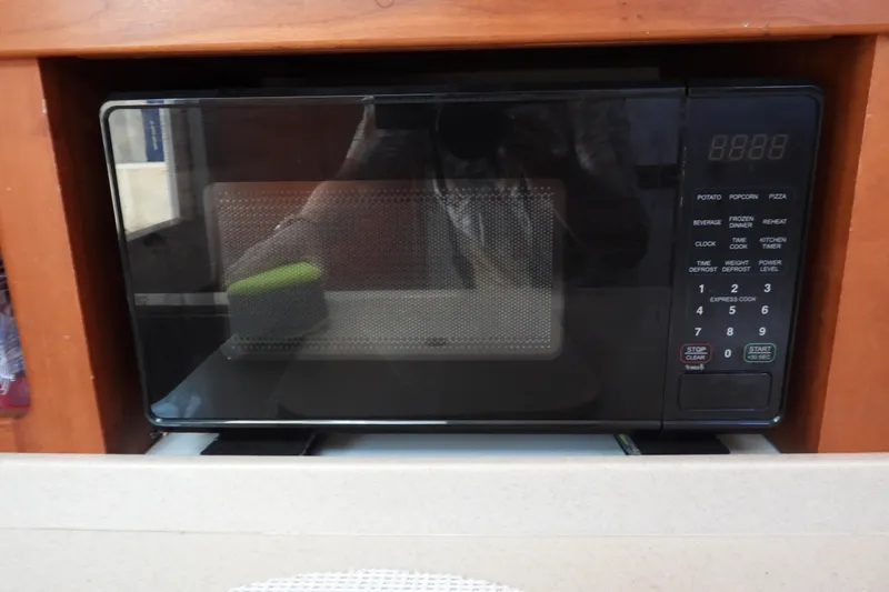  Yacht Photos Pics Microwave oven in a 2005 Back Cove 29 boat kitchen setup.