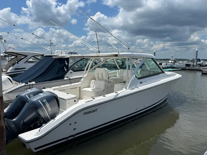  Yacht Photos Pics 2015 Pursuit DC 325 Dual Console boat docked with Yamaha engines.